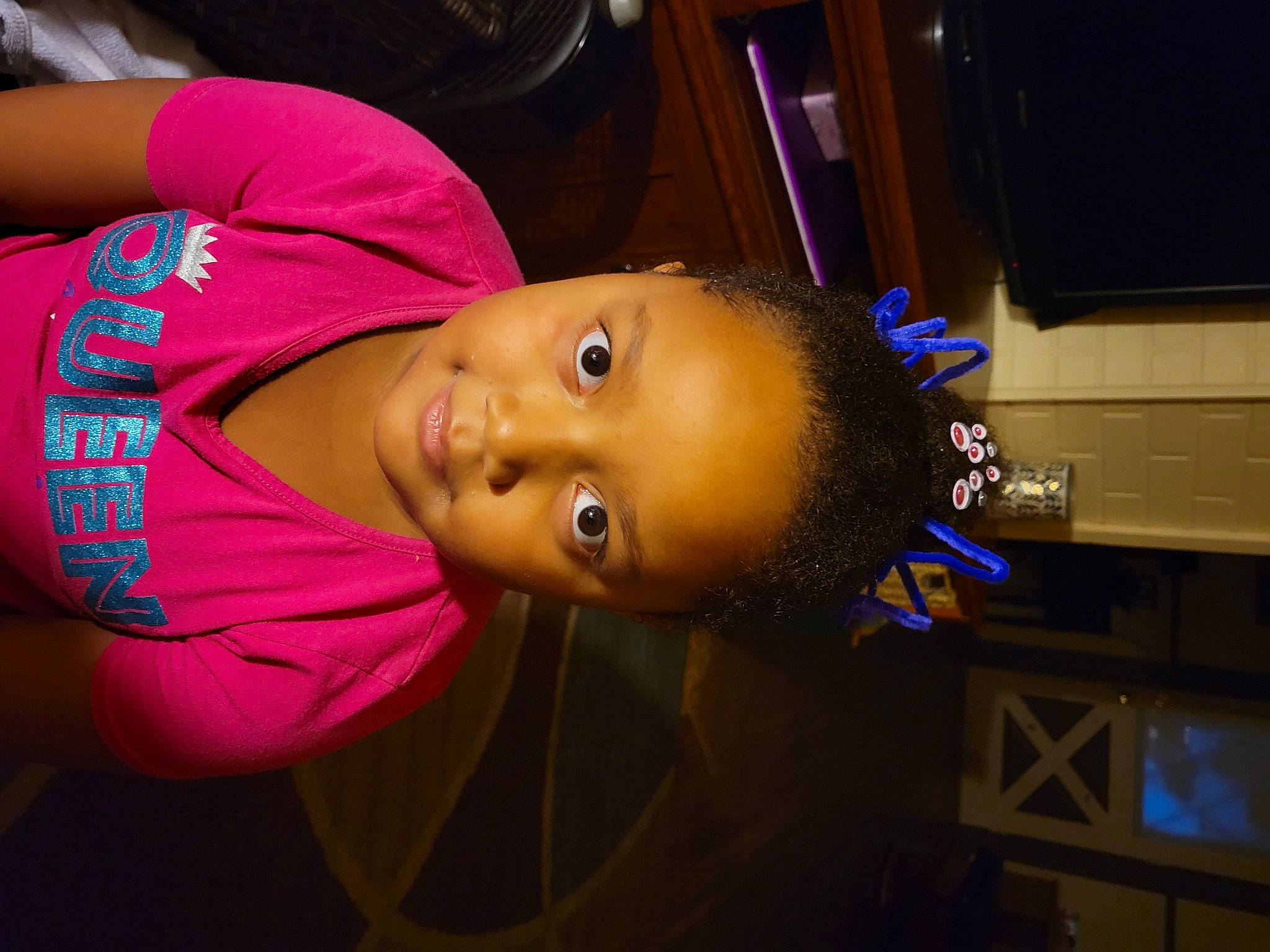 Layla is registered to the contest to win money with this photo: cap, cheek, child, electric_blue, event, eyebrow, face, flash_photography, fun, happy, hat, magenta, nose, person, purple, room, smile, t_shirt, television, toddler