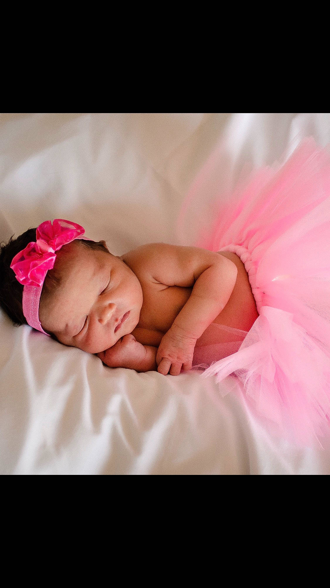 Lai is registered to the contest to win money with this photo: baby, baby_products, baby_sleeping, baby_toddler_clothing, child, costume, flesh, hair_accessory, hand, headband, headgear, headpiece, person, photograph, photography, pink, product, skin, stomach, toddler