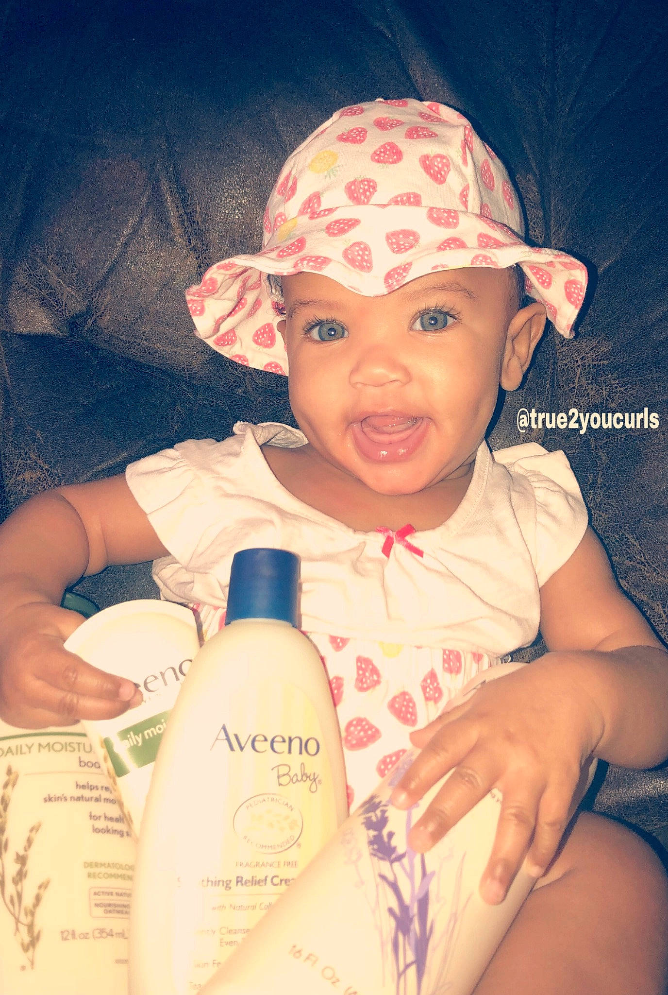 Lai joined the competition — help win amazing prizes! baby, baby_products, bottle, cap, cheek, child, drink, drinkware, ear, face, forehead, fun, happy, head, headgear, headwear, person, product, skin, smile