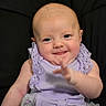 baby, infant, smile, face, child, lavender, dress, lace, floral, embroidery, arm, hand, blue_eyes, cute, portrait, sitting, happy, innocence, background, person