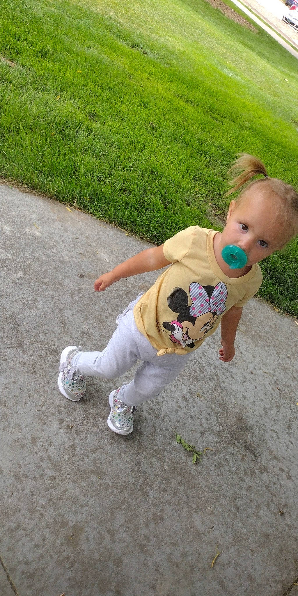 Lilly joined the competition — help win amazing prizes! asphalt, baby, baby_toddler_clothing, eyewear, flooring, fun, grass, happy, human_body, human_leg, lawn, leisure, people_in_nature, person, plant, recreation, sidewalk, sitting, soil, t_shirt