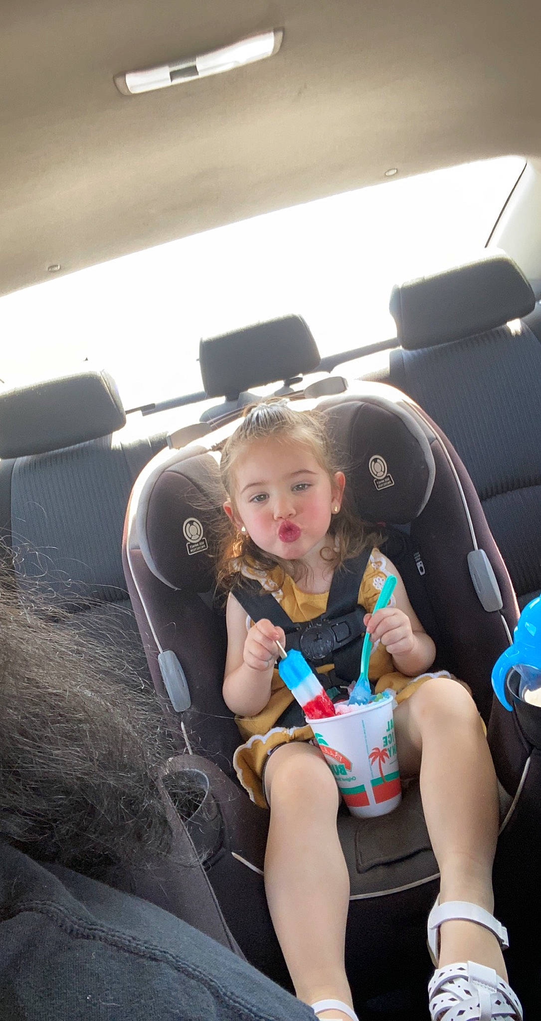 Kalyna is registered to the contest to win money with this photo: air_travel, auto_part, automotive_design, automotive_exterior, car, car_seat, car_seat_cover, family_car, head_restraint, leg, motor_vehicle, person, personal_luxury_car, seat_belt, steering_part, steering_wheel, thigh, toddler, vehicle, vehicle_door