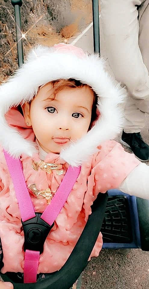 Kalyna joined the competition — help win amazing prizes! baby_toddler_clothing, cap, cheek, child, cool, costume, eyebrow, eyelash, face, fur_clothing, glove, hairstyle, happy, iris, lip, person, pink, skin, sleeve, textile