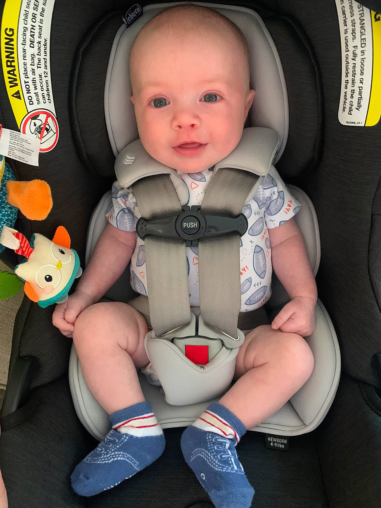 Jason joined the competition — help win amazing prizes! arm, auto_part, baby, baby_carriage, baby_in_car_seat, baby_products, baby_safety, baby_toddler_clothing, car_seat, child, comfort, eye, lap, person, personal_protective_equipment, seat_belt, sitting, smile, sneakers, toddler