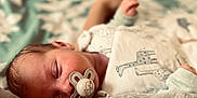 Aymen participe au concours pour gagner de l'argent avec cette photo : animal_print, baby, bed, blanket, closeup, comfort, cozy, cute, face, hand, infant, newborn, pacifier, peaceful, portrait, resting, skin, sleeping, soft_focus, toddler