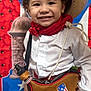 Morgan Xavier is registered to the contest to win money with this photo: child, toddler, smiling, face, hat, straw_hat, red_bandana, white_shirt, bag, puerto_rico_flag, costume, traditional_clothing, portrait, indoors, rope, background, colorful, happy, person, celebration