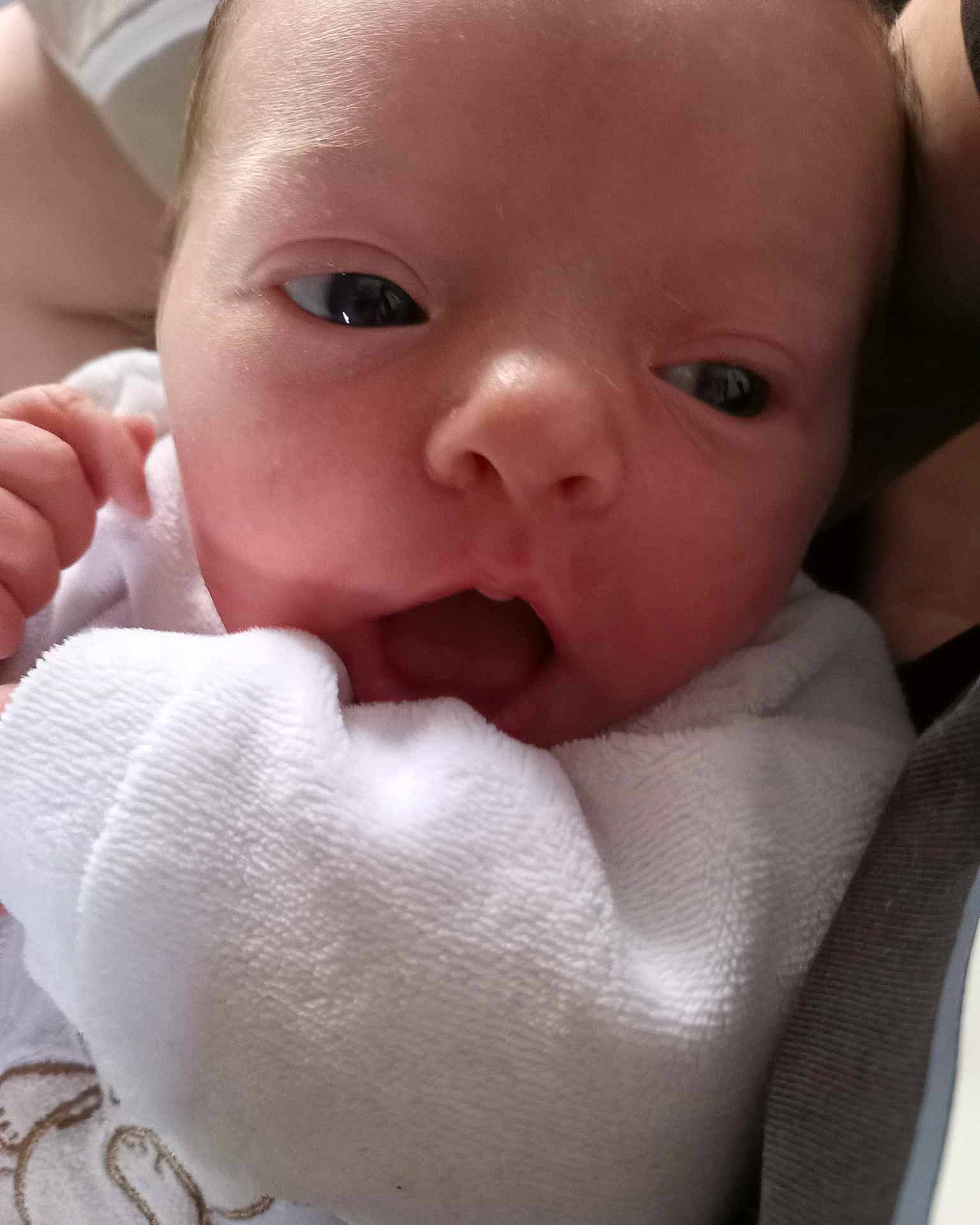 Elyana participe au concours pour gagner de l'argent avec cette photo : baby, baby_products, baby_toddler_clothing, cheek, child, chin, comfort, ear, eyebrow, eyelash, finger, gesture, iris, lip, mouth, nail, nose, person, skin, thumb