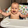 Fin is registered to the contest to win money with this photo: architecture, baby, chair, crib, cushion, cutlery, face, furniture, happy, head, homedecor, hottub, indoors, infantbed, person, photography, portrait, spoon, table, tub