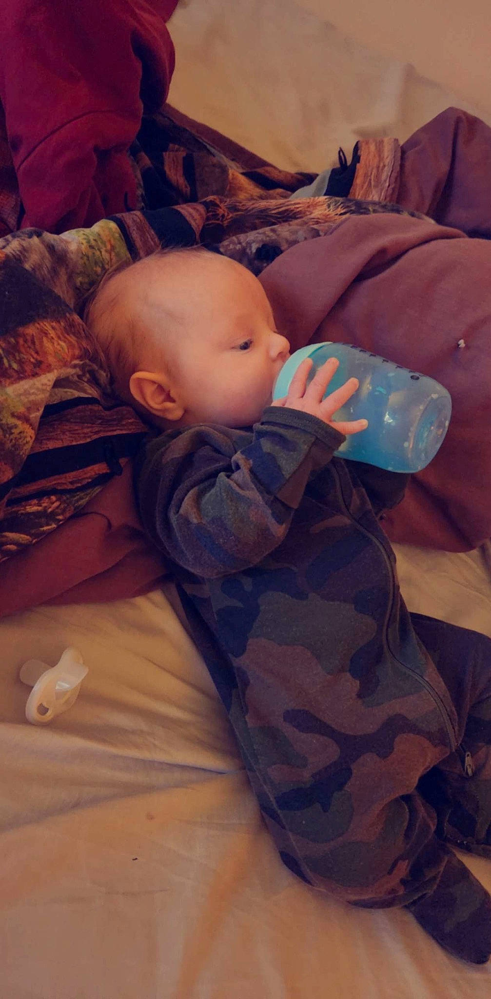 Ryland is registered to the contest to win money with this photo: baby, baby_sleeping, baby_toddler_clothing, bedtime, camouflage, cheek, child, cloud, comfort, cool, happy, linens, military_camouflage, mouth, nose, pattern, person, skin, sleeve, toddler