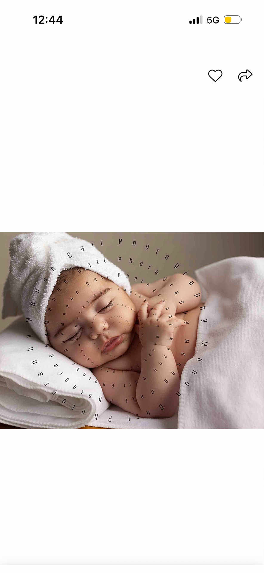 Elvy participe au concours pour gagner de l'argent avec cette photo : baby, infant, newborn, sleeping, towel, blanket, towel_hat, wrapped, portrait, watermark, hands, pillow, soft_texture, studio_photography, peaceful, cute, face, skin, closeup, bed