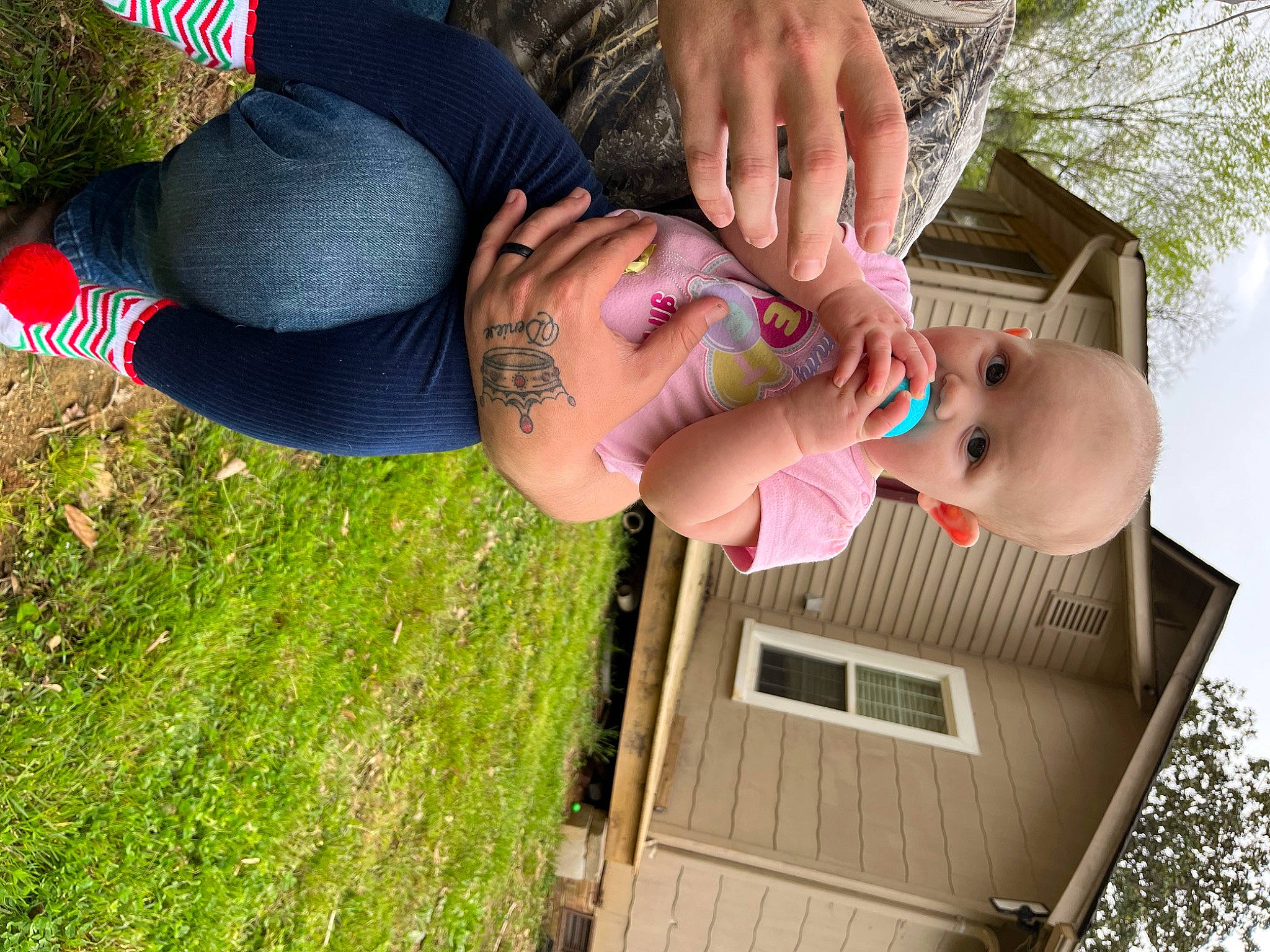 Belle is registered to the contest to win money with this photo: clothing, finger, glasses, grass, green, happy, house, human_body, joint, leg, leisure, people_in_nature, person, photograph, pink, plant, sunglasses, thigh, toddler, tree