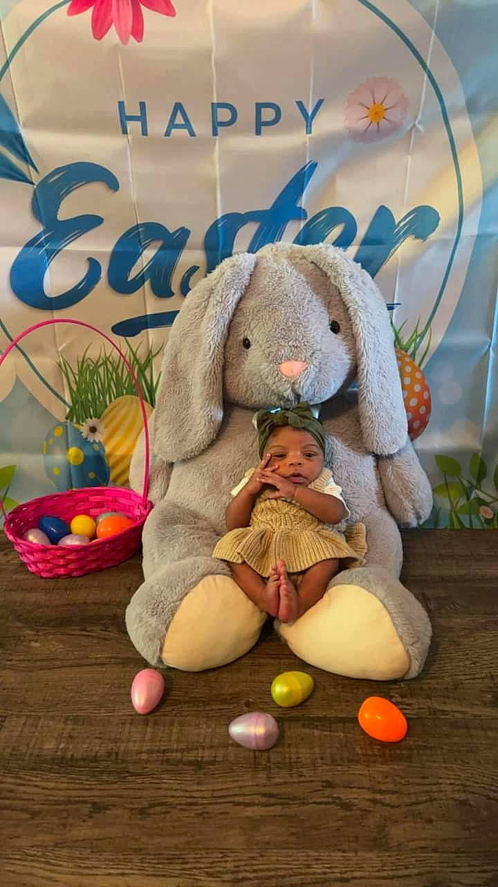 Aria joined the competition — help win amazing prizes! baby_products, baby_toddler_clothing, baby_toys, child, fawn, foot, fun, fur, grass, happy, natural_foods, person, plant, plush, room, sitting, stuffed_toy, teddy_bear, toddler, toy