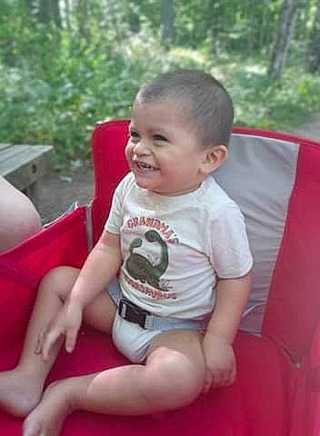 Jordan is registered to the contest to win money with this photo: baby, baby_products, child, joy, leg, leisure, person, pink, plant, play, product, recreation, sitting, skin, smile, summer, toddler, vacation