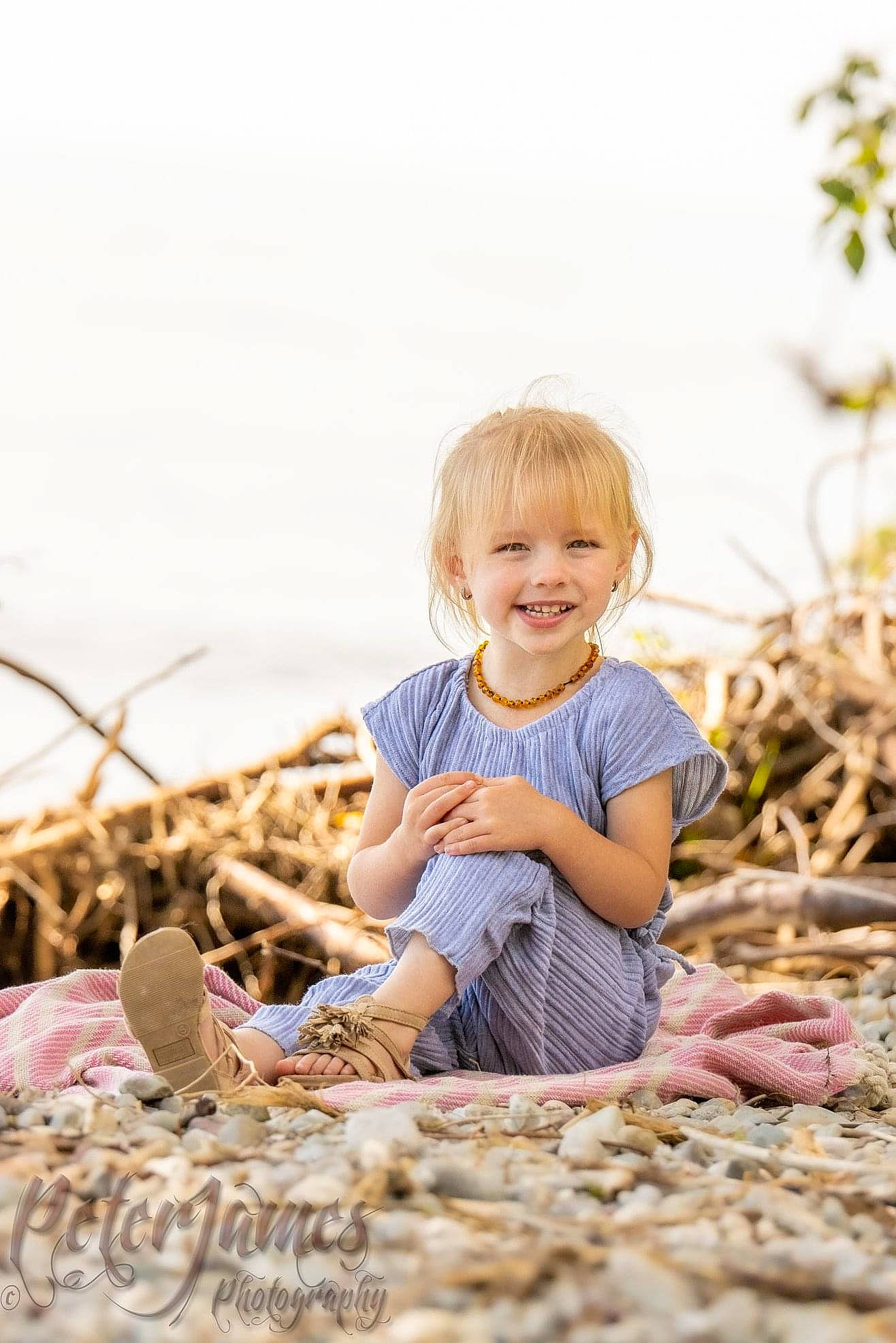 Gemma joined the competition — help win amazing prizes! baby, basket, blond, child, fun, grass, happy, joy, pebble, person, photograph, photography, play, playing_with_kids, portrait, sitting, smile, stock_photography, toddler