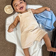 Eren is registered to the contest to win money with this photo: baby, blue_cloth, carpet, cheerful, child, cute, expression, face, four_months, happy, indoors, infant, lying_down, milestone_marker, person, romper, skin, smiling, white_mat, young
