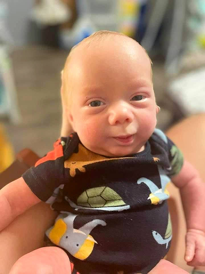 Mason joined the competition — help win amazing prizes! arm, baby, baby_products, baby_toddler_clothing, cheek, child, eye, fun, happy, iris, nose, pattern, person, personal_protective_equipment, sitting, skin, sleeve, smile, t_shirt, toddler