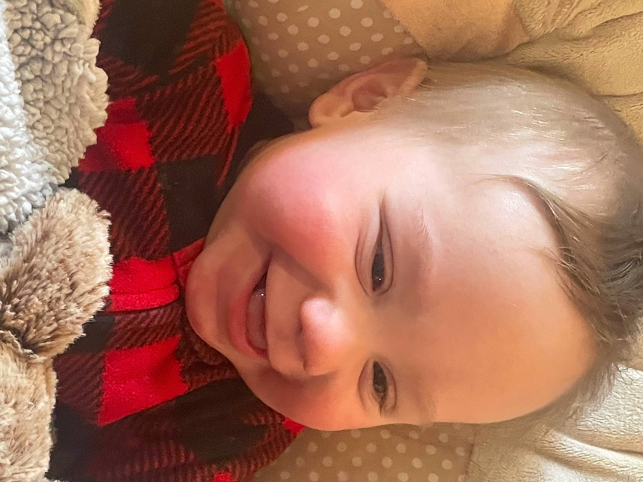 Mason is registered to the contest to win money with this photo: baby_toddler_clothing, cheek, chin, comfort, eye, eyebrow, eyelash, face, happy, head, headgear, iris, joy, lip, mouth, nose, person, plant, skin, smile