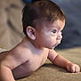 Benjamin joined the competition — help win amazing prizes! baby, diaper, tummy, couch, infant, child, skin, face, curious, lying_down, indoors, soft_surface, young, person, eyes, expression, hair, plush, home, portrait