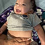 Benjamin joined the competition — help win amazing prizes! baby, smiling, happy, infant, hand, blanket, diaper, clothing, tshirt, lying_down, indoor, skin, cute, person, human, face, head, expression, comfort, care