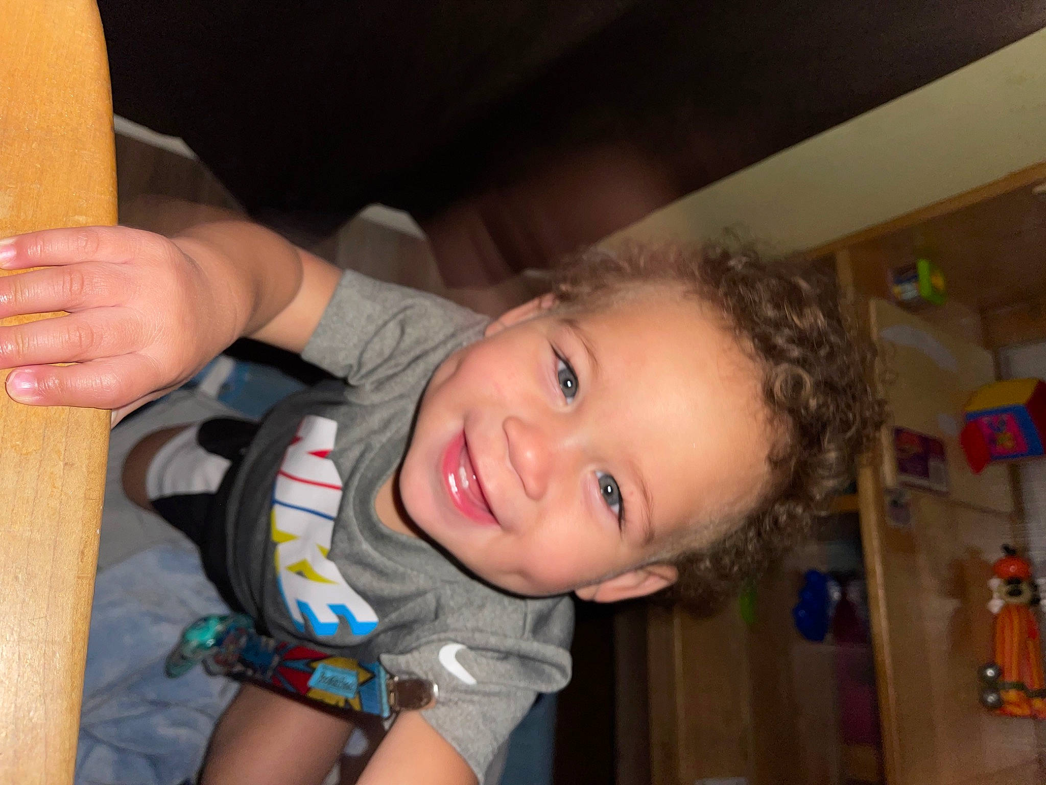 Bentley is registered to the contest to win money with this photo: arm, chair, cheek, child, elbow, eyebrow, finger, fun, gesture, happy, human_body, iris, joy, mouth, neck, nose, person, skin, smile, thigh