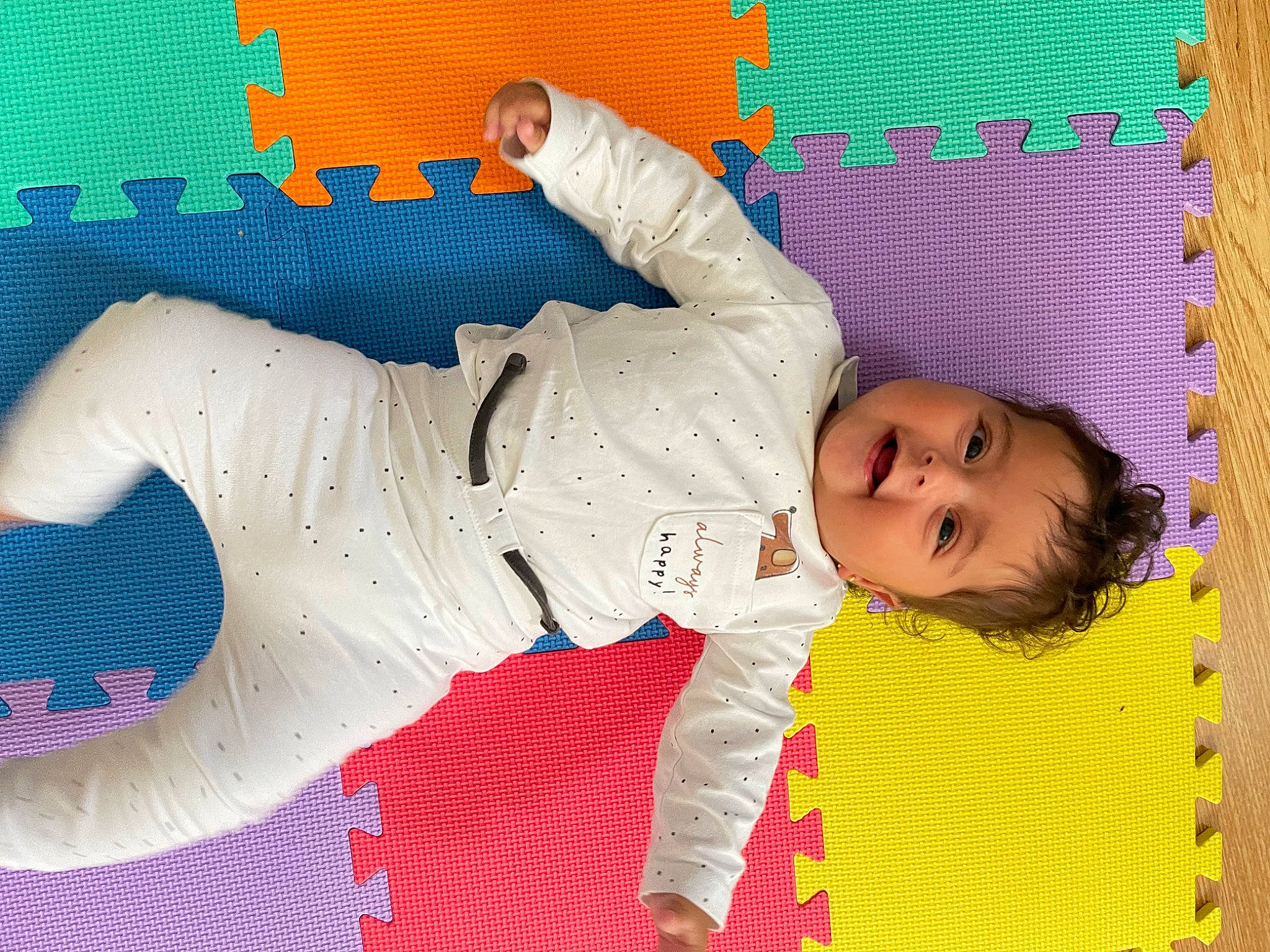 Fatima is registered to the contest to win money with this photo: baby, baby_products, baby_safety, baby_toddler_clothing, baby_toys, bed, bedtime, child, comfort, electric_blue, flooring, fun, happy, linens, pattern, person, play, room, sleeve, toddler