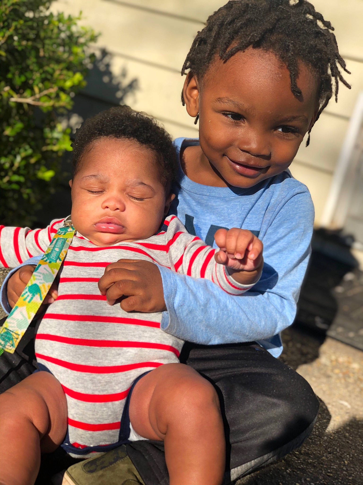 Travon joined the competition — help win amazing prizes! adaptation, baby, black_hair, cheek, child, daughter, face, fun, gesture, happy, human, joint, joy, people, person, play, sibling, sitting, skin, smile