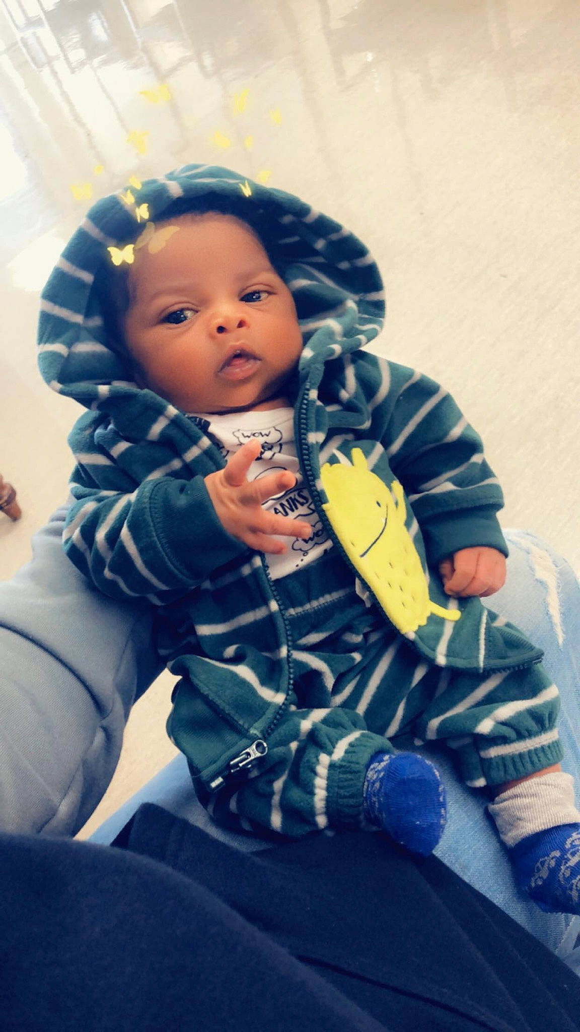 Kamerin is registered to the contest to win money with this photo: baby, baby_products, blue, cheek, child, cool, eye, outerwear, person, play, sitting, skin, smile, toddler