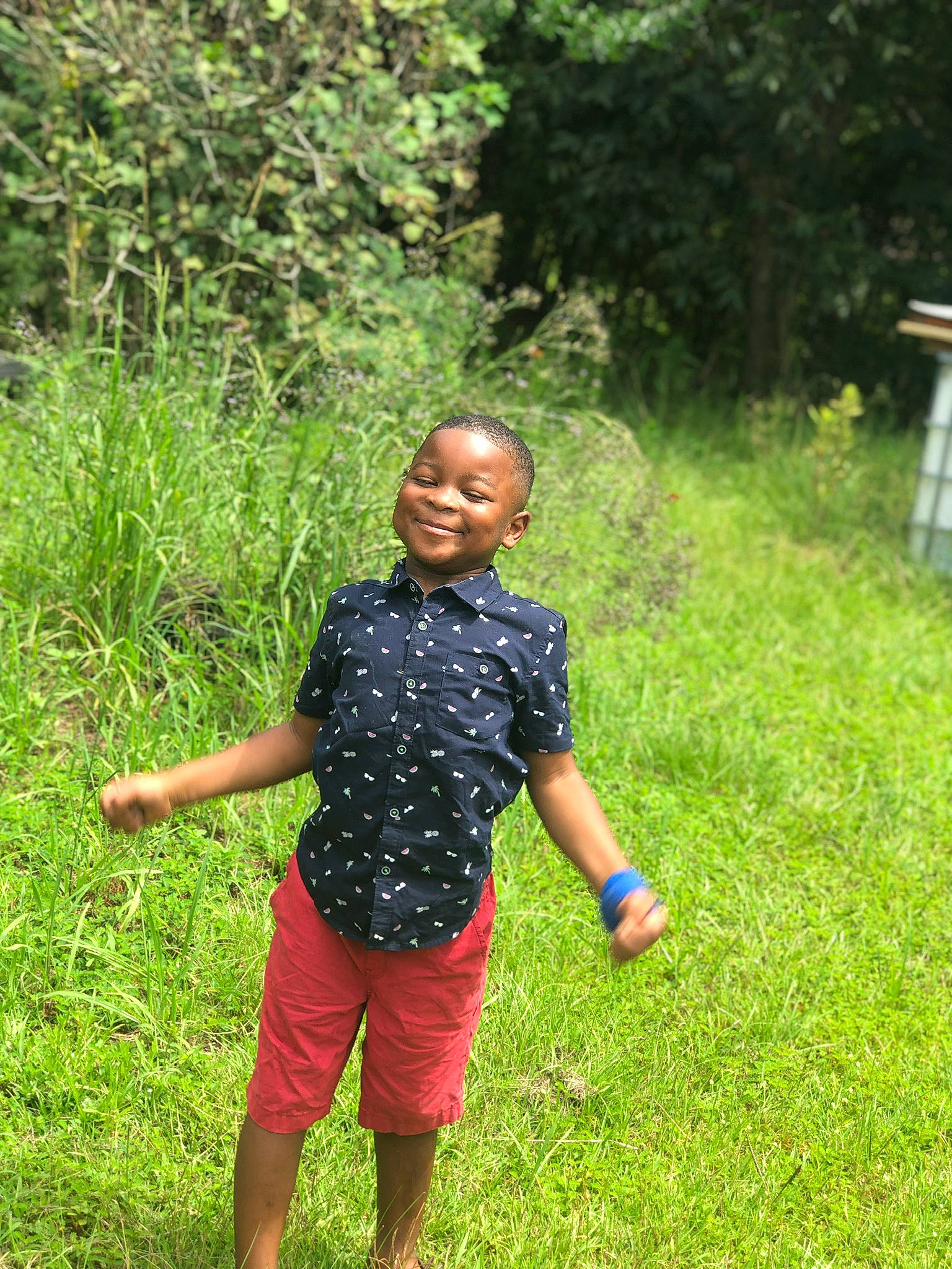 Jordan is registered to the contest to win money with this photo: adaptation, child, fun, grass, grass_family, grassland, green, happy, joy, meadow, people_in_nature, person, plant, play, summer, vacation