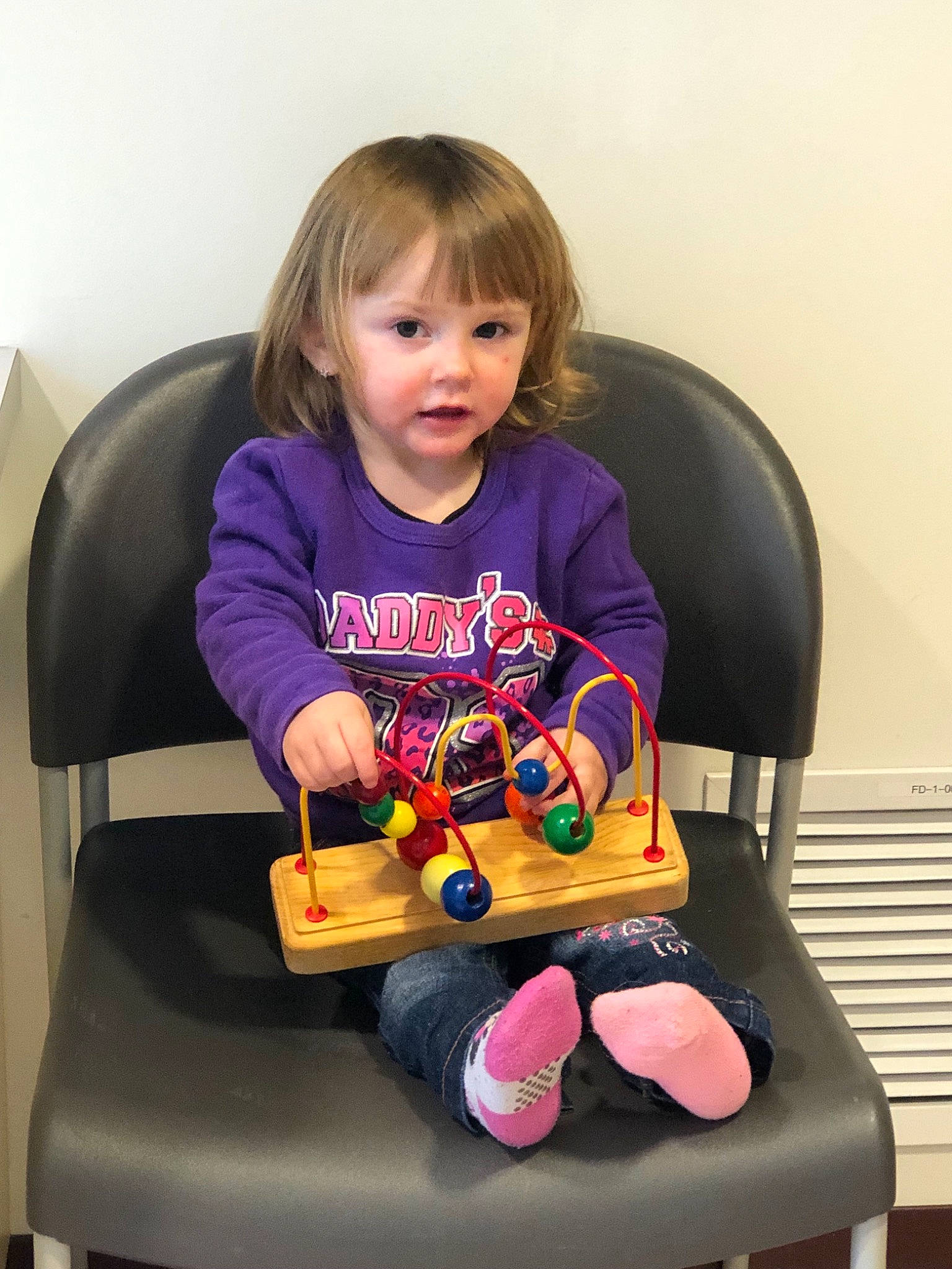 Audriana is registered to the contest to win money with this photo: child, fun, person, play, product, purple, sitting, table, toddler, toy