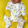 Kataleya Toro joined the competition — help win amazing prizes! baby, sleeping, onesie, mittens, headband, yellow, floral_pattern, blanket, infant, soft_fabric, cute, peaceful, resting, clothing, portrait, indoors, child, newborn, face, cozy