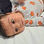 Bianca joined the competition — help win amazing prizes! baby, child, clothing, cute, expression, eyes, face, head, human, indoors, infant, lying_down, onesie, portrait, pumpkin_pattern, skin, sleepwear, soft_lighting, white_background, young_child
