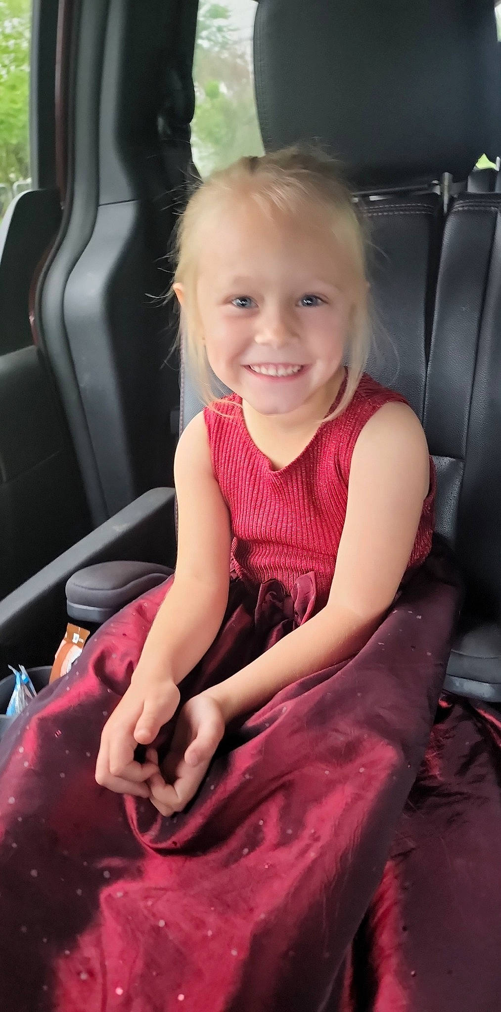Oaklynn is registered to the contest to win money with this photo: auto_part, automotive_design, beauty, car_seat, car_seat_cover, chair, child, comfort, finger, fun, happy, joy, lap, magenta, motor_vehicle, person, pink, sitting, skin, smile