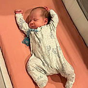 Honey joined the competition — help win amazing prizes! baby, newborn, sleeping, crib, onesie, giraffe_pattern, infant, bed, mattress, sleep, cute, child, pajamas, arms_up, peaceful, indoors, soft_lighting, resting, infant_clothing, nursery