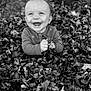 baby, child, smiling, autumn, leaves, outdoor, nature, portrait, black_and_white, happy, cute, infant, fall, season, hands, face, clothing, person, ground, tree