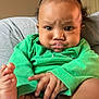 Dazia is registered to the contest to win money with this photo: accessories, baby, bodypart, couch, cushion, earring, face, finger, furniture, hand, happy, head, homedecor, indoors, jewelry, mouth, person, photography, portrait, teeth