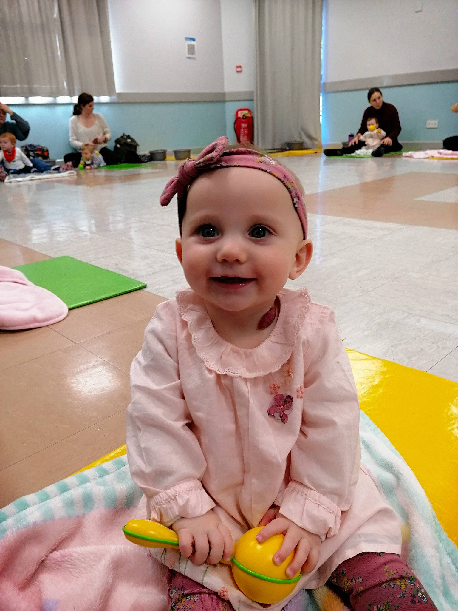 Lottie joined the competition — help win amazing prizes! arm, baby, baby_toddler_clothing, blurred, child, face, floor, flooring, fun, happy, head, headwear, joy, leisure, people, person, photograph, pink, skin, smile