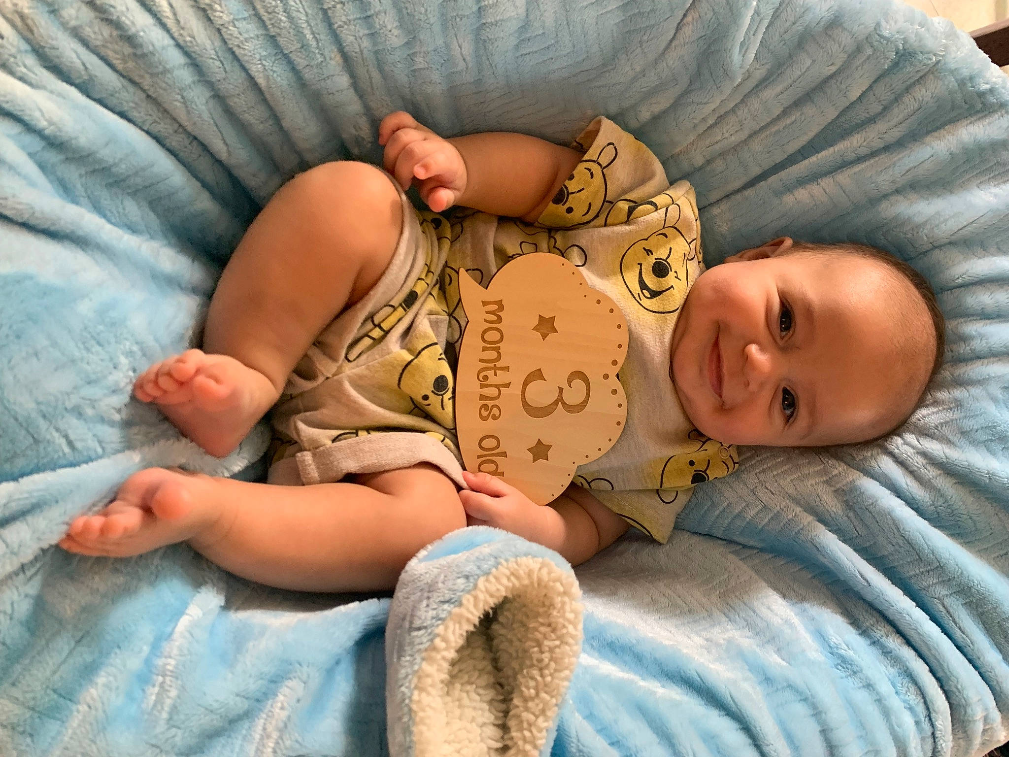 Josiah is registered to the contest to win money with this photo: abdomen, baby, baby_sleeping, baby_toddler_clothing, bedtime, cheek, child, comfort, couch, eye, facial_expression, head, human_body, human_leg, joy, linens, person, room, skin, smile