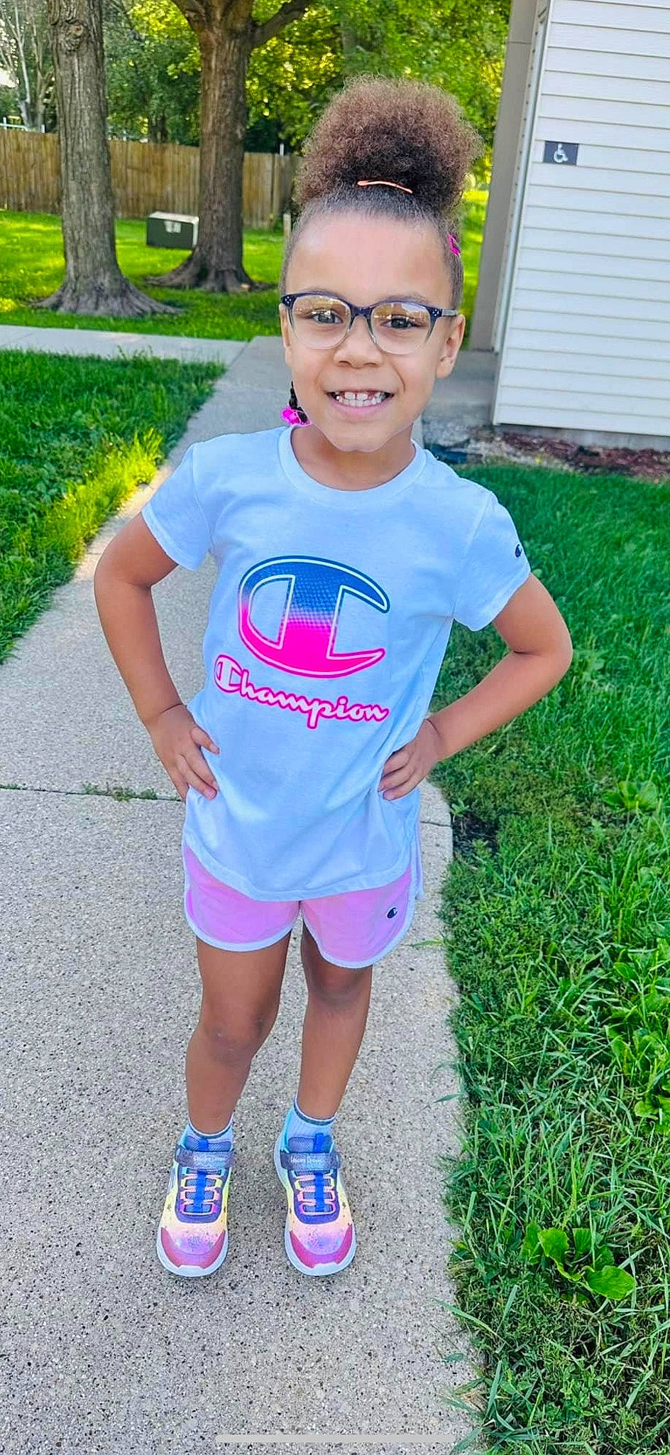 Aubreigh joined the competition — help win amazing prizes! baby_toddler_clothing, blue, cool, electric_blue, face, fun, grass, green, happy, joy, leisure, magenta, person, photograph, pink, plant, shorts, sleeve, smile, sneakers
