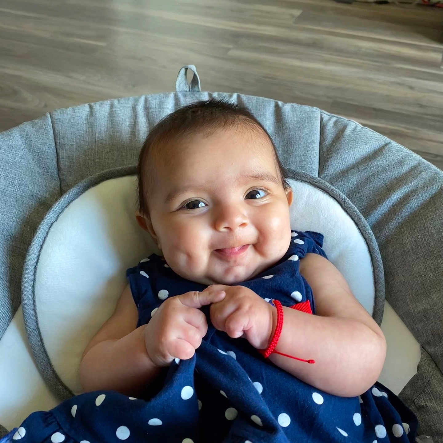 Evelina is registered to the contest to win money with this photo: accessories, baby, chair, clothing, couch, cushion, cutlery, dress, face, furniture, happy, head, homedecor, pants, person, photography, portrait, sitting, smile, spoon