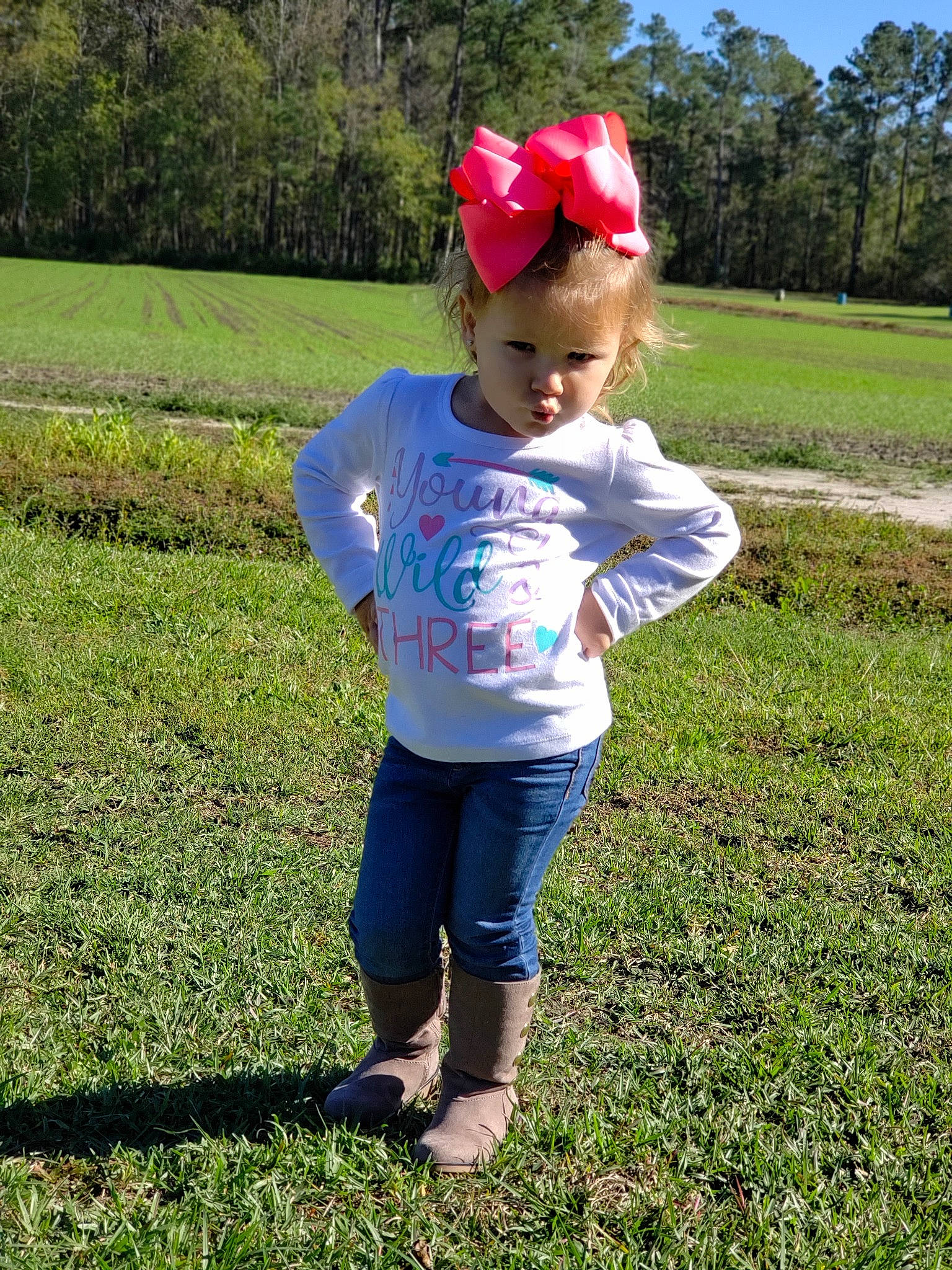Ryker is registered to the contest to win money with this photo: child, grass, grassland, headgear, meadow, person, plant, play, toddler