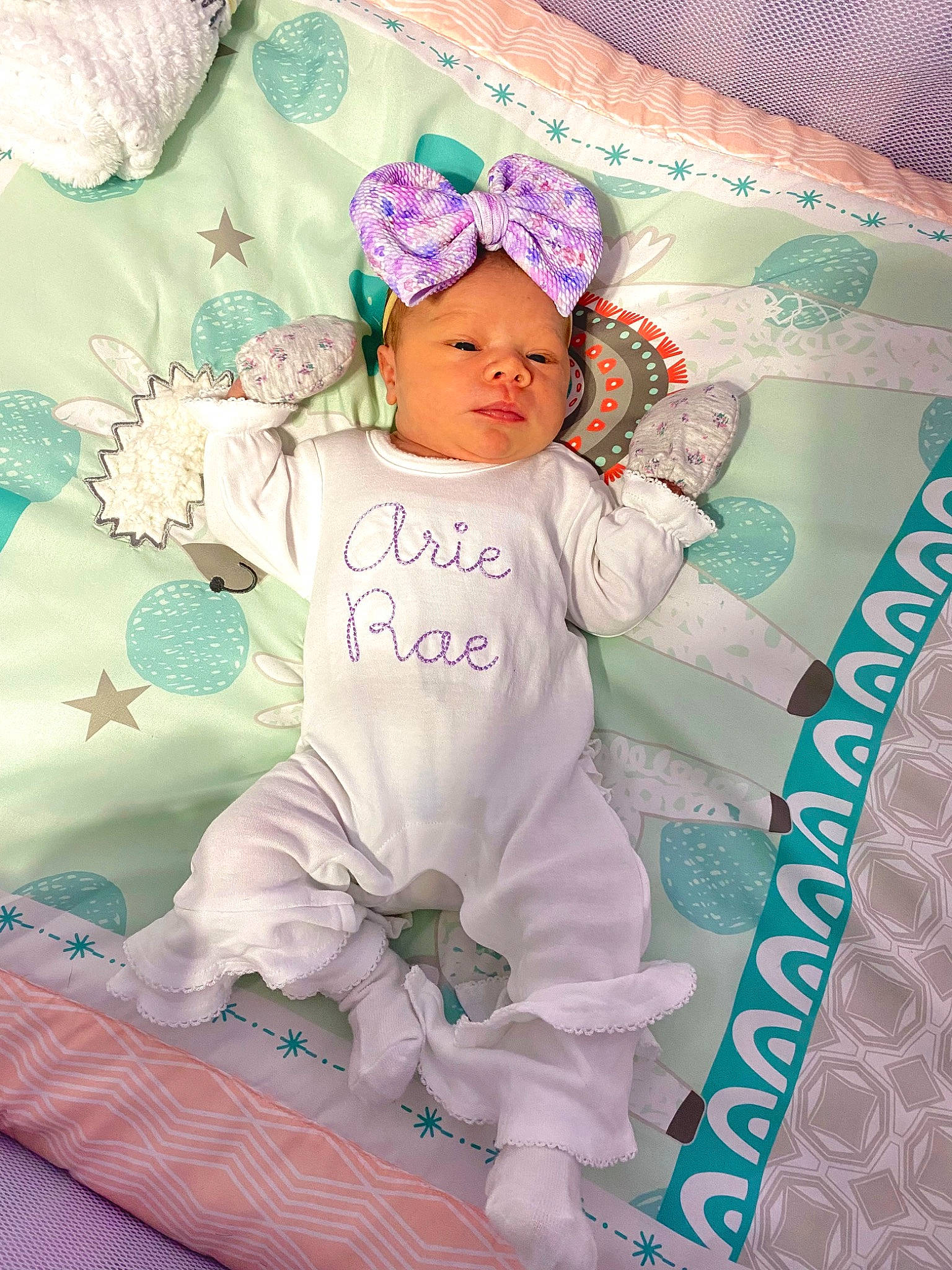 Arie joined the competition — help win amazing prizes! baby, baby_products, baby_safety, baby_sleeping, baby_toddler_clothing, cap, child, font, happy, headwear, linens, magenta, pattern, person, pink, product, purple, room, sleeve, textile