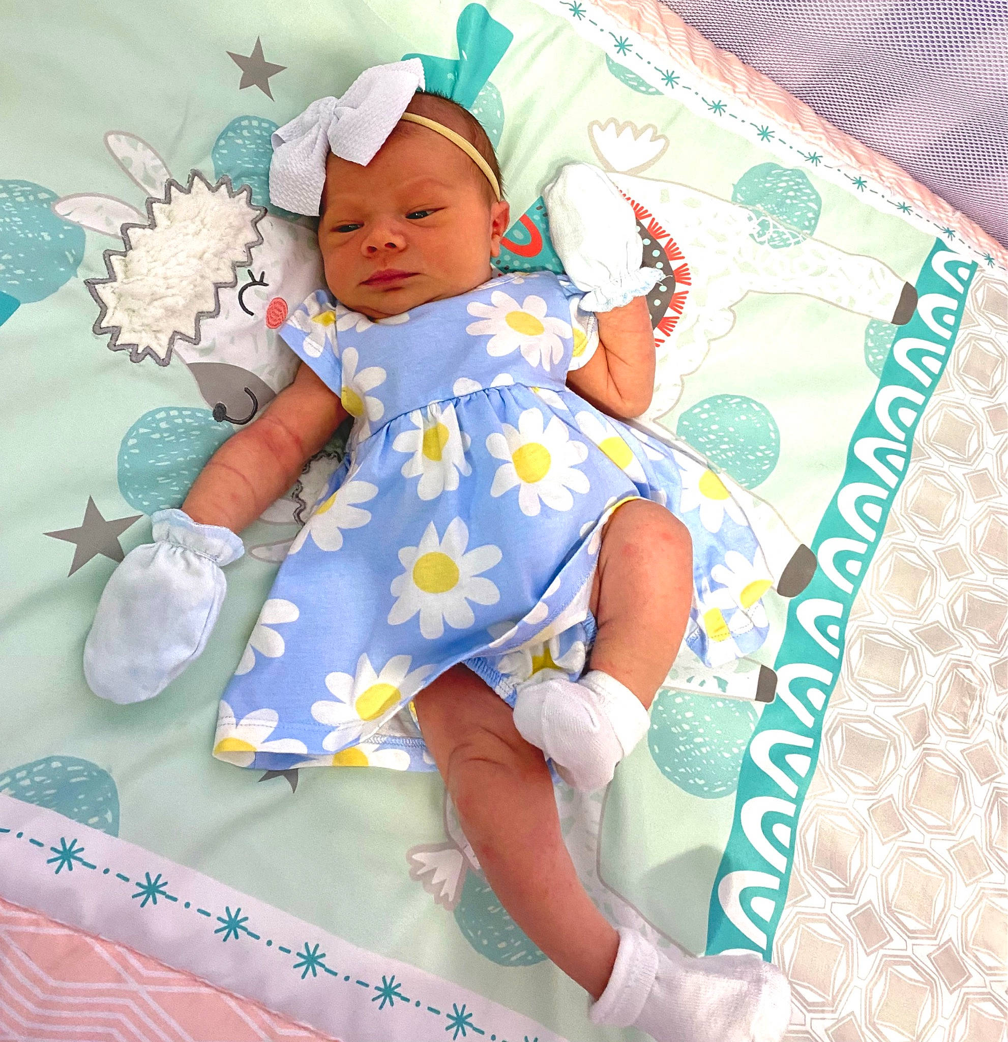 Arie joined the competition — help win amazing prizes! aqua, art, baby, baby_products, baby_safety, baby_sleeping, baby_toddler_clothing, baby_toys, bedding, child, comfort, happy, headwear, linens, magenta, pattern, person, pink, room, toddler