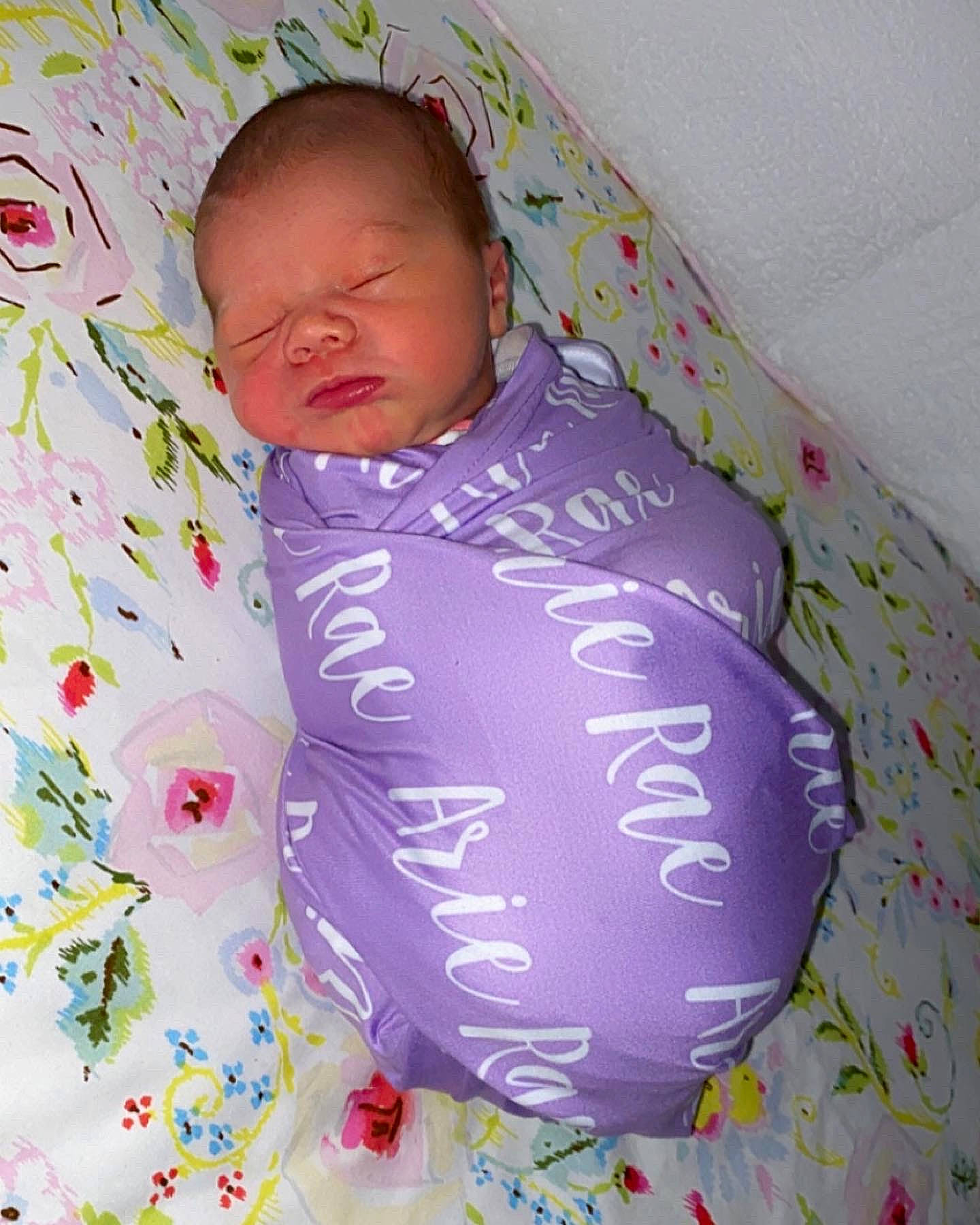 Arie is registered to the contest to win money with this photo: baby, baby_products, baby_sleeping, baby_toddler_clothing, bedding, bedtime, child, comfort, linens, magenta, nap, pattern, person, pink, purple, room, sleep, sleeve, textile, toddler