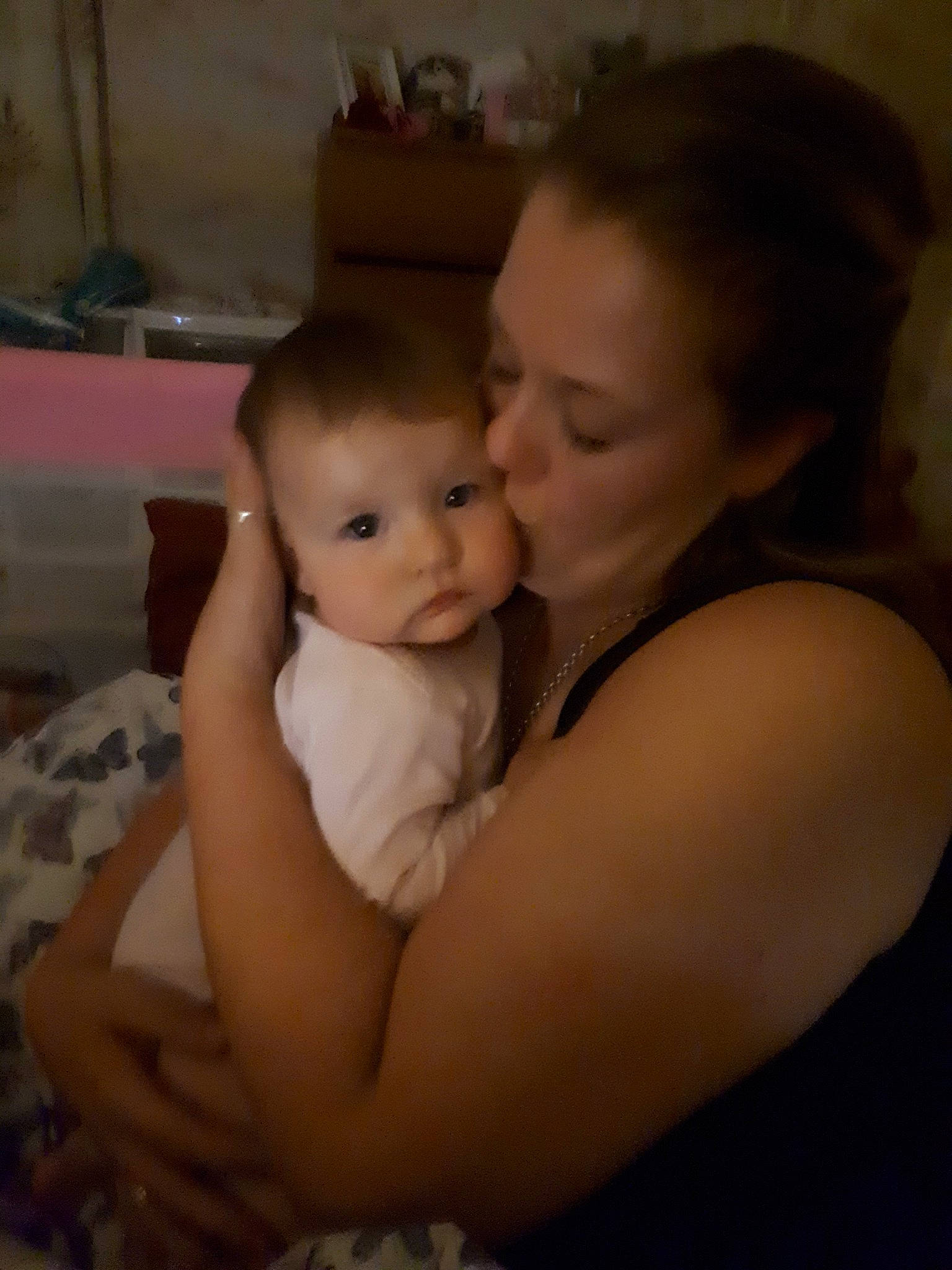 Lily is registered to the contest to win money with this photo: baby, cheek, child, daughter, ear, eye, face, finger, happy, hug, interaction, iris, love, mother, person, skin, smile, toddler