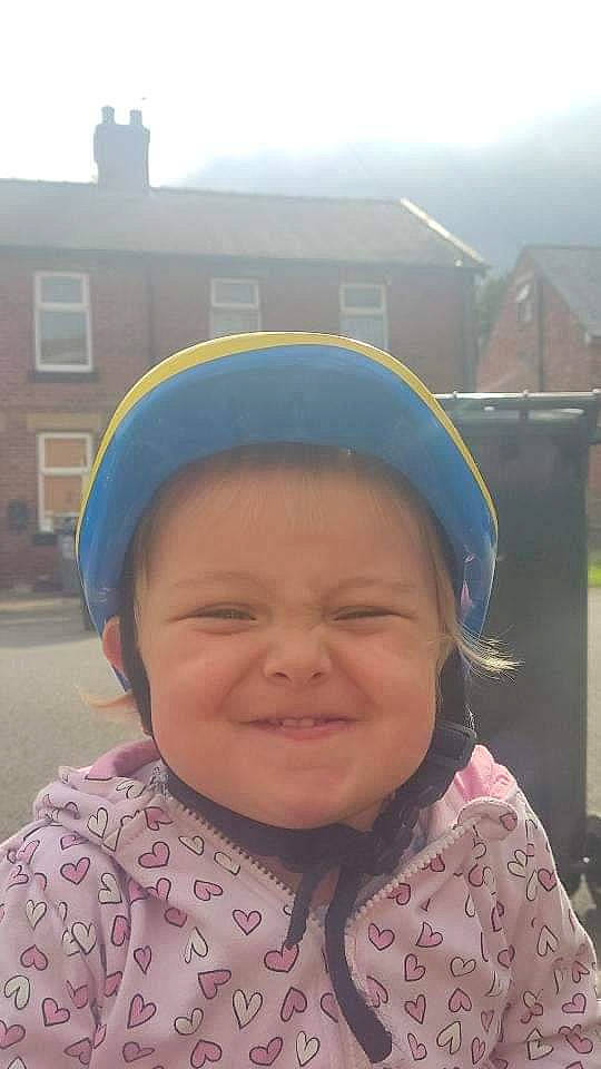 Annalise is registered to the contest to win money with this photo: cap, clothing, cool, eye, eyebrow, face, facial_expression, fun, happy, headgear, joy, leisure, lip, mouth, nose, outerwear, person, pink, skin, smile