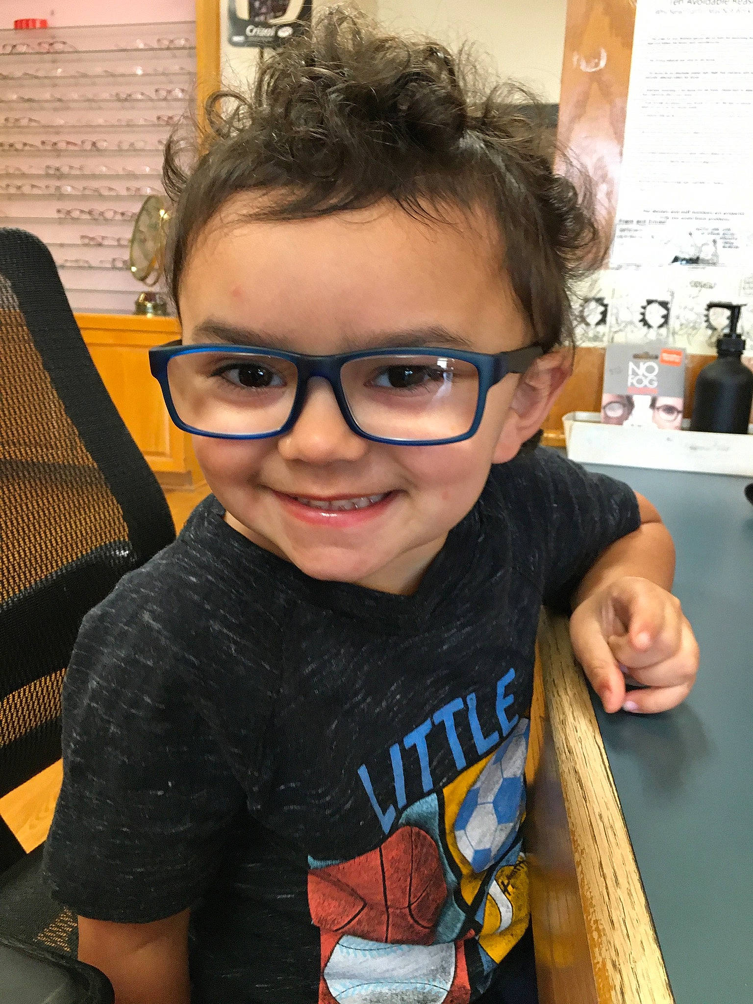 Jamari joined the competition — help win amazing prizes! chair, chin, cool, ear, eyelash, eyewear, forehead, fun, gesture, glasses, hairstyle, happy, joy, nose, person, personal_protective_equipment, sleeve, smile, t_shirt, thumb