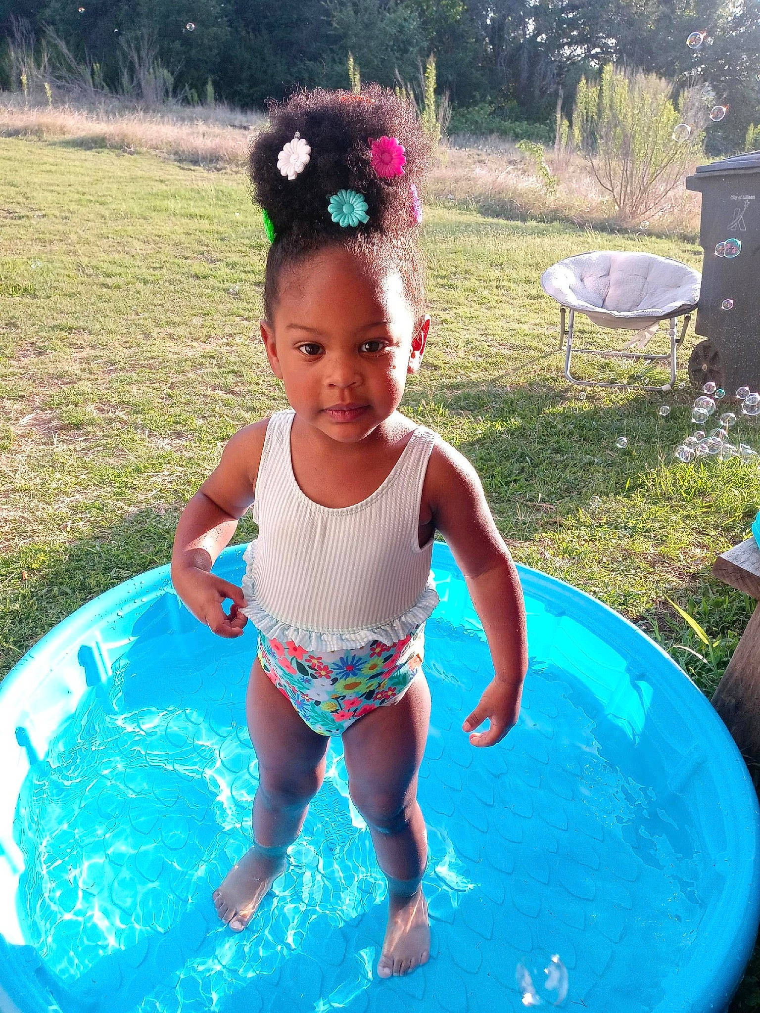 Queen joined the competition — help win amazing prizes! baby_toddler_clothing, barefoot, bathing, child, fun, grass, green, happy, leisure, person, pink, plant, recreation, smile, summer, swimwear, thigh, toddler, tree, vacation