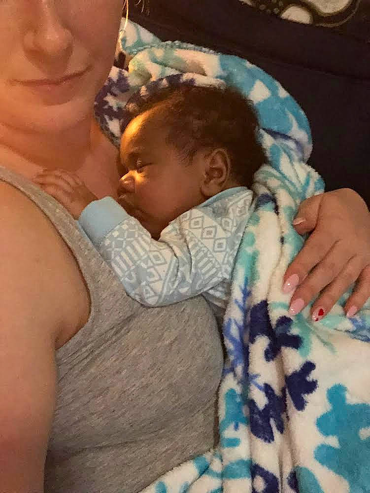 Keith Jr is registered to the contest to win money with this photo: abdomen, baby, baby_products, chest, child, comfort, ear, elbow, gesture, happy, hug, linens, mouth, nose, pattern, person, skin, t_shirt, textile, toddler