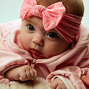 Mazikeen joined the competition — help win amazing prizes! baby, infant, pink_bow, headband, pink_clothing, cute, child, close_up, portrait, hand, soft_texture, fluffy, cozy, young_child, skin, eyes, face, expression, adorable, newborn