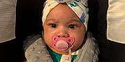 Ophelia joined the competition — help win amazing prizes! baby, pacifier, car_seat, blanket, headwear, infant, child, straps, closeup, cute, expression, indoors, soft_toys, comfort, seatbelt, clothing, person, adorable, head, face